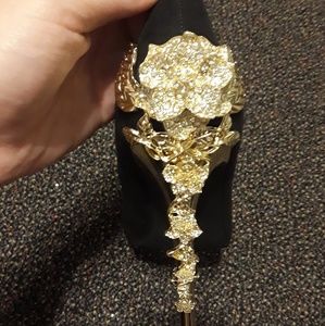 Black heels with gold rose on back